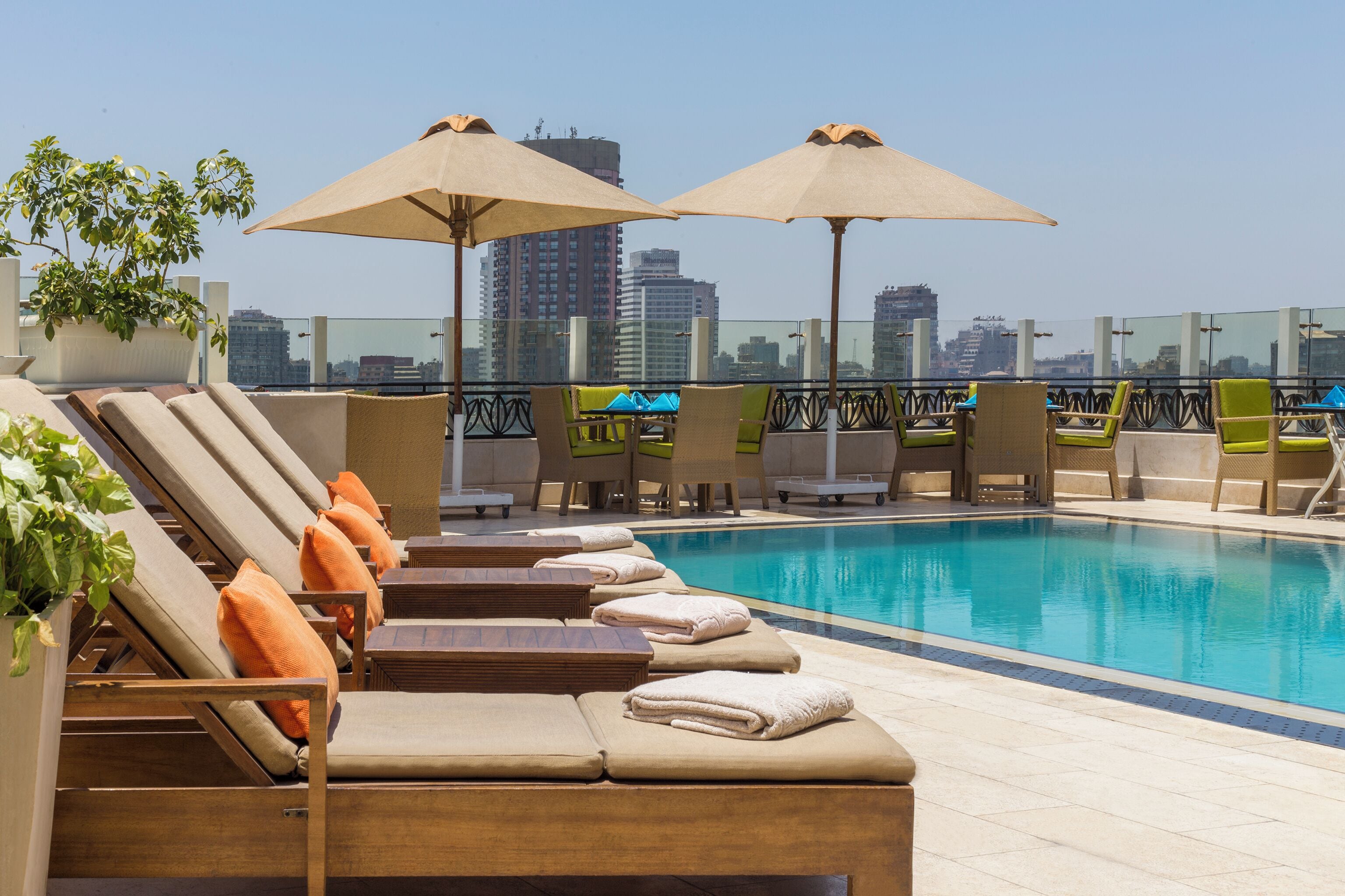 Outdoor pool, open 7:00 AM to 5:00 PM, pool umbrellas, pool loungers