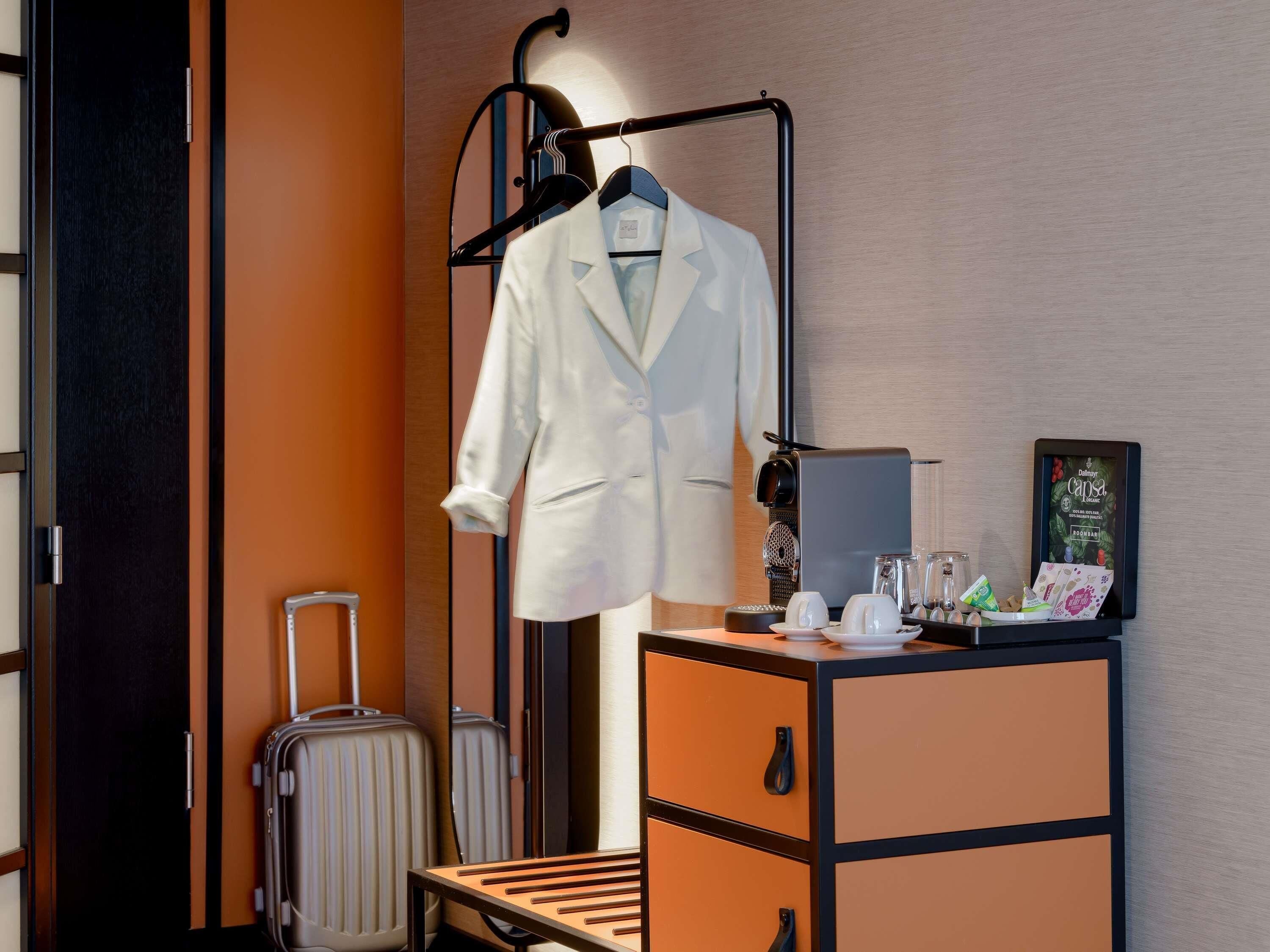 Premium bedding, free minibar, in-room safe, laptop workspace