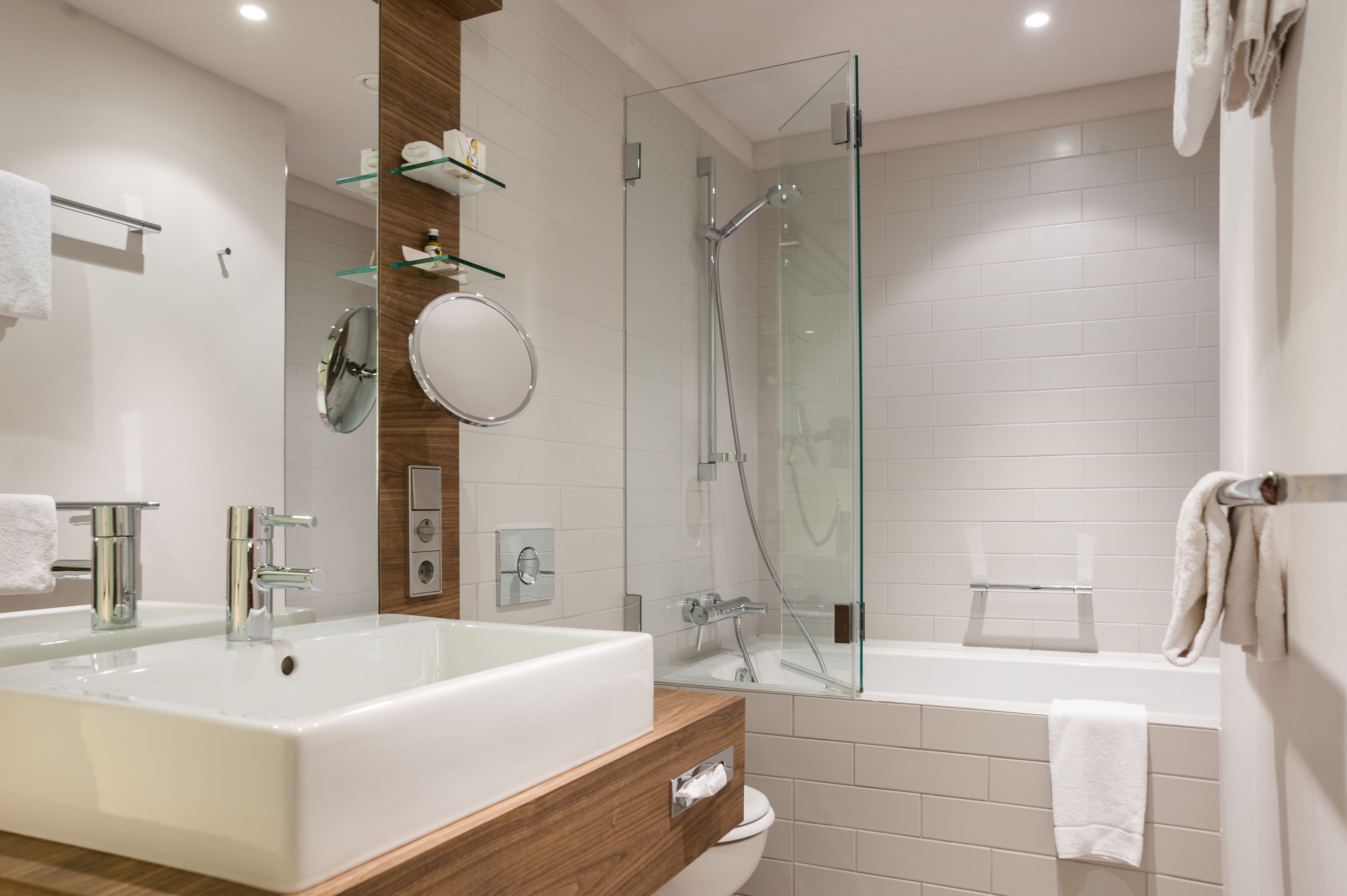deluxe double room | bathroom | eco-friendly toiletries, hair dryer, towels