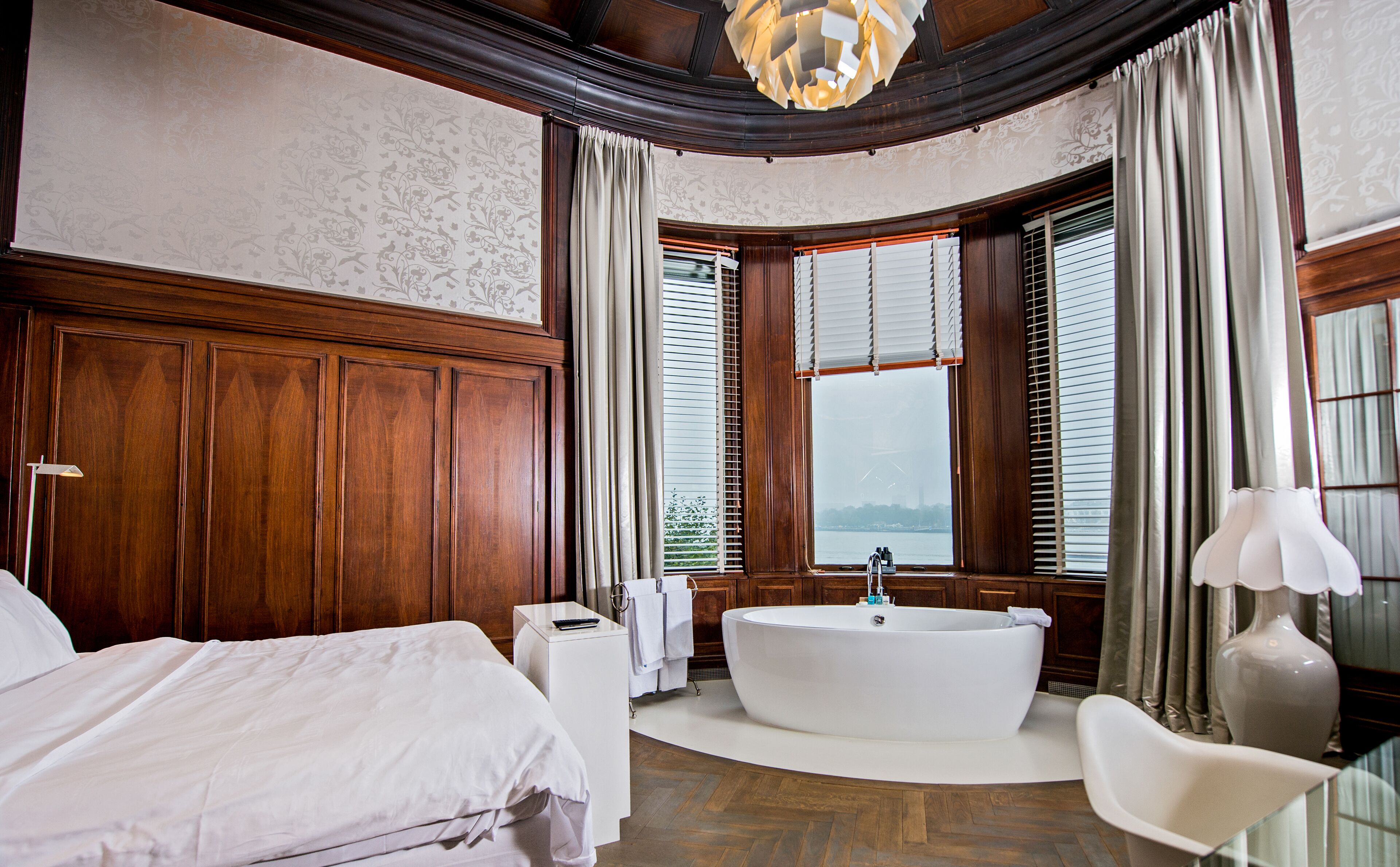 presidential suite, river view | bathroom | eco-friendly toiletries, hair dryer, towels, soap