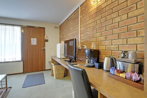 Habitación Deluxe, bañera de hidromasaje | Servicio de la habitación