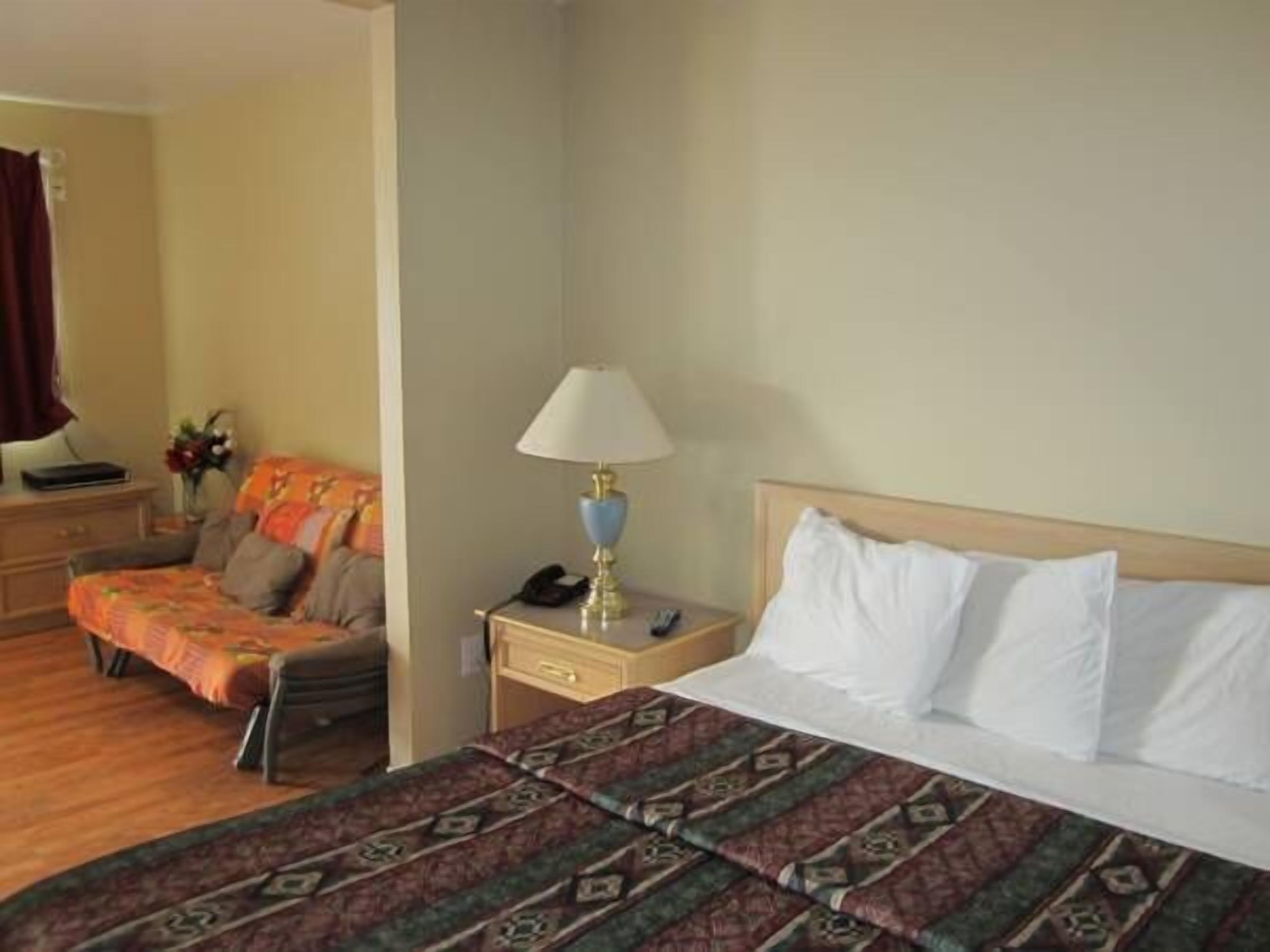 Chambre Standard, 1 grand lit | Rideaux occultants, Wi-Fi gratuit, draps fournis