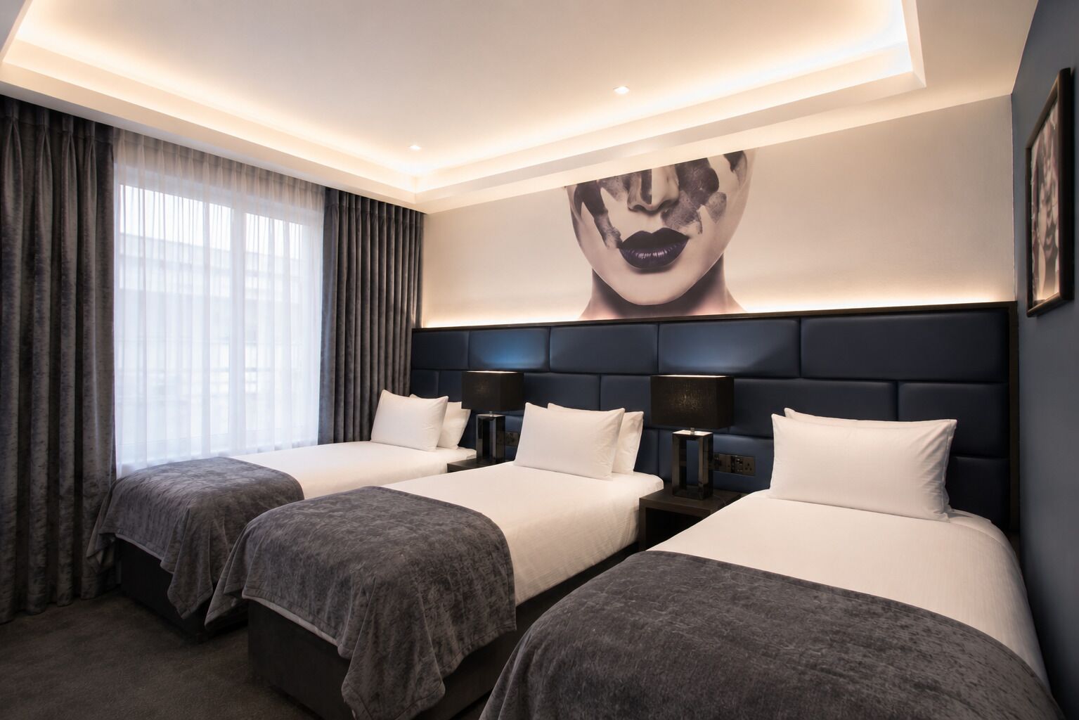 Triple Room | Pillowtop beds, in-room safe, desk, blackout drapes