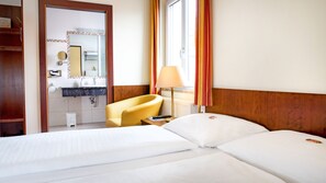 Habitació doble clàssica | Roba de llit d'alta qualitat i matalassos amb encoixinament addicional 