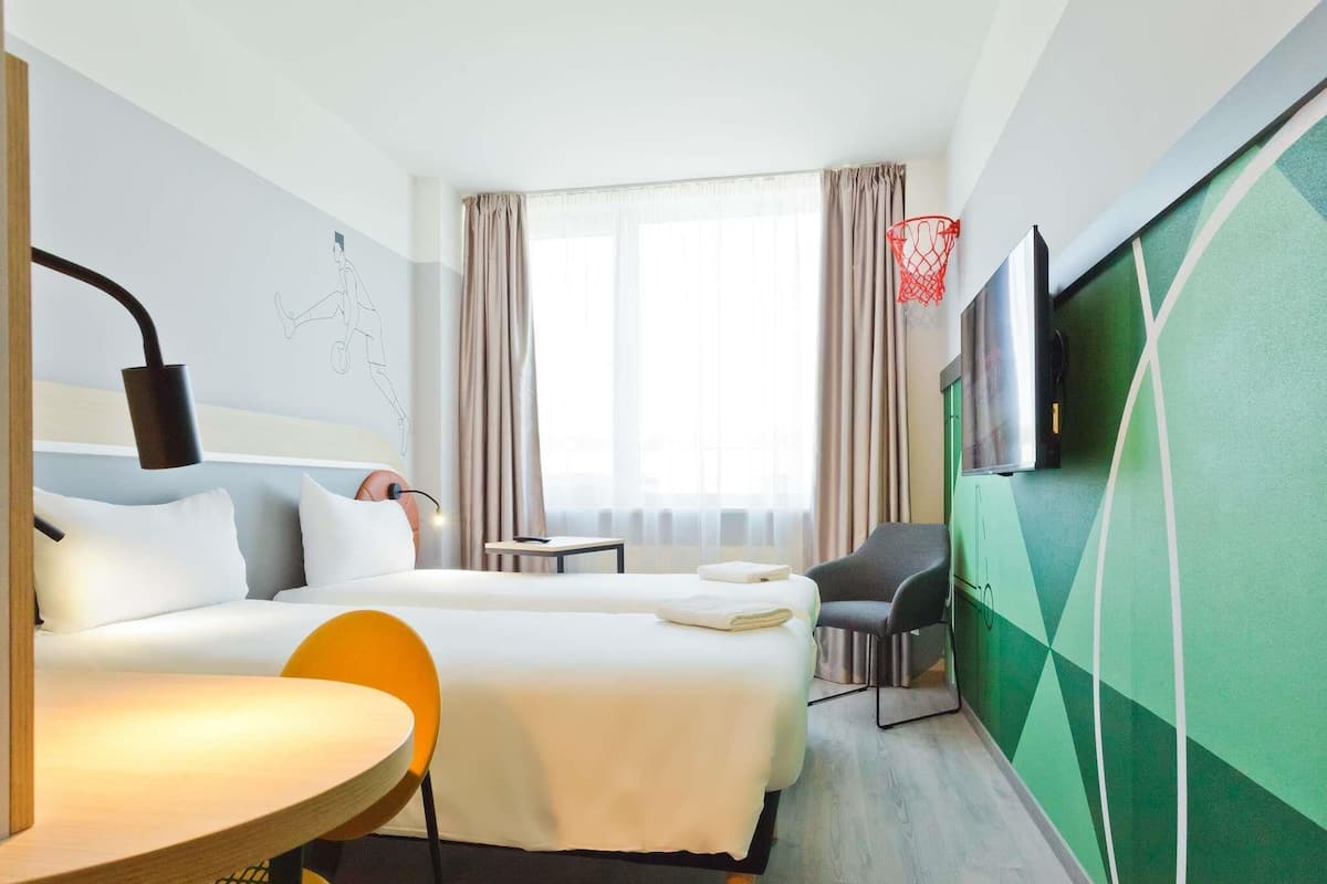 Room, 2 Single Beds | Desk, soundproofing, iron/ironing board, free cots/infant beds