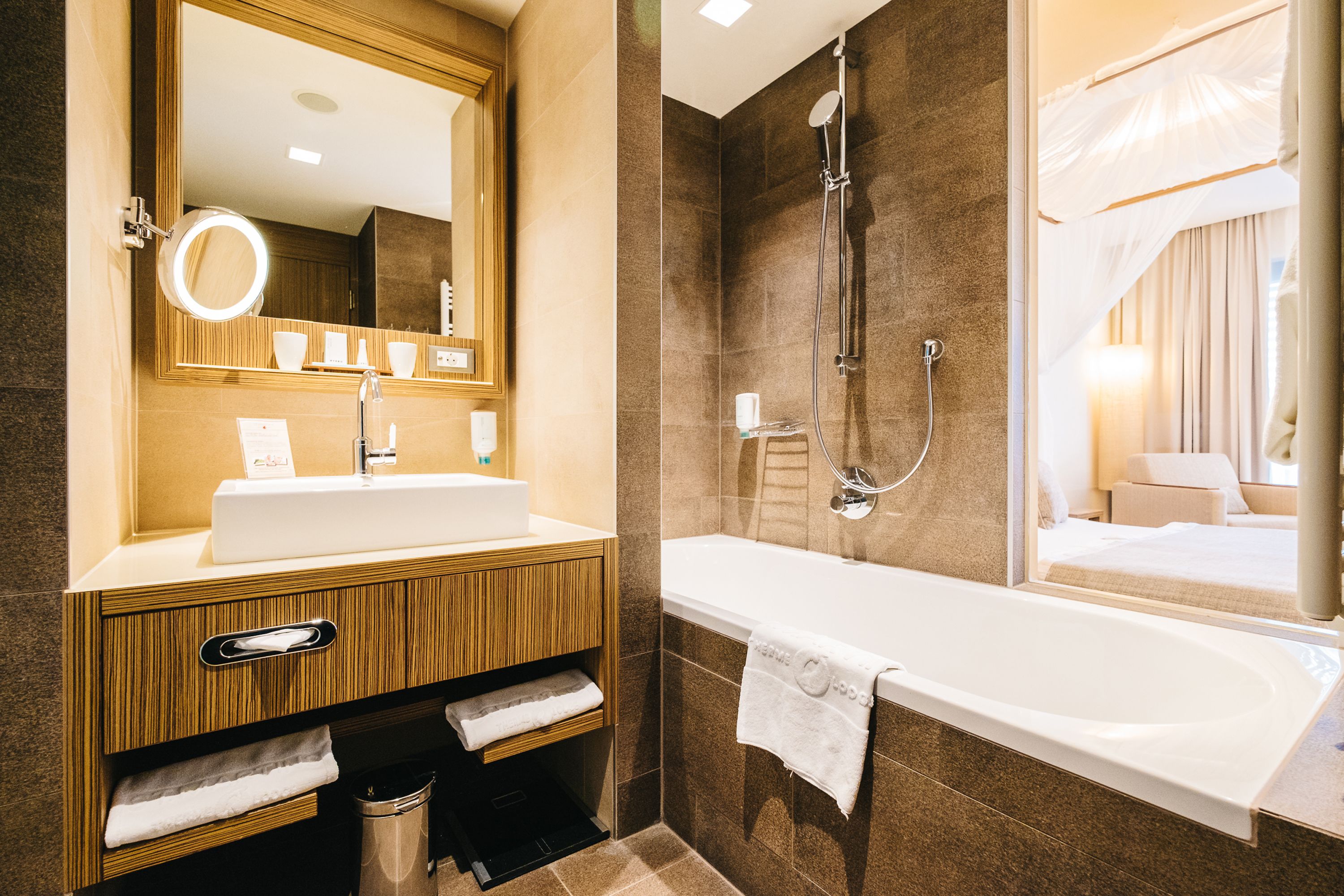 hair dryer, bathrobes, towels, soap