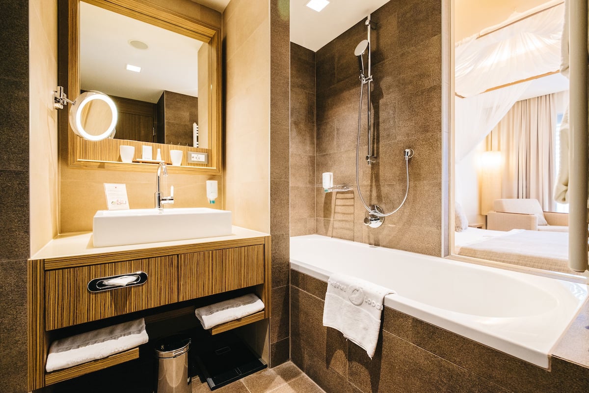 hair dryer, bathrobes, towels, soap