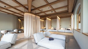 A spacious room with a high ceiling, modern furniture, and a large window.