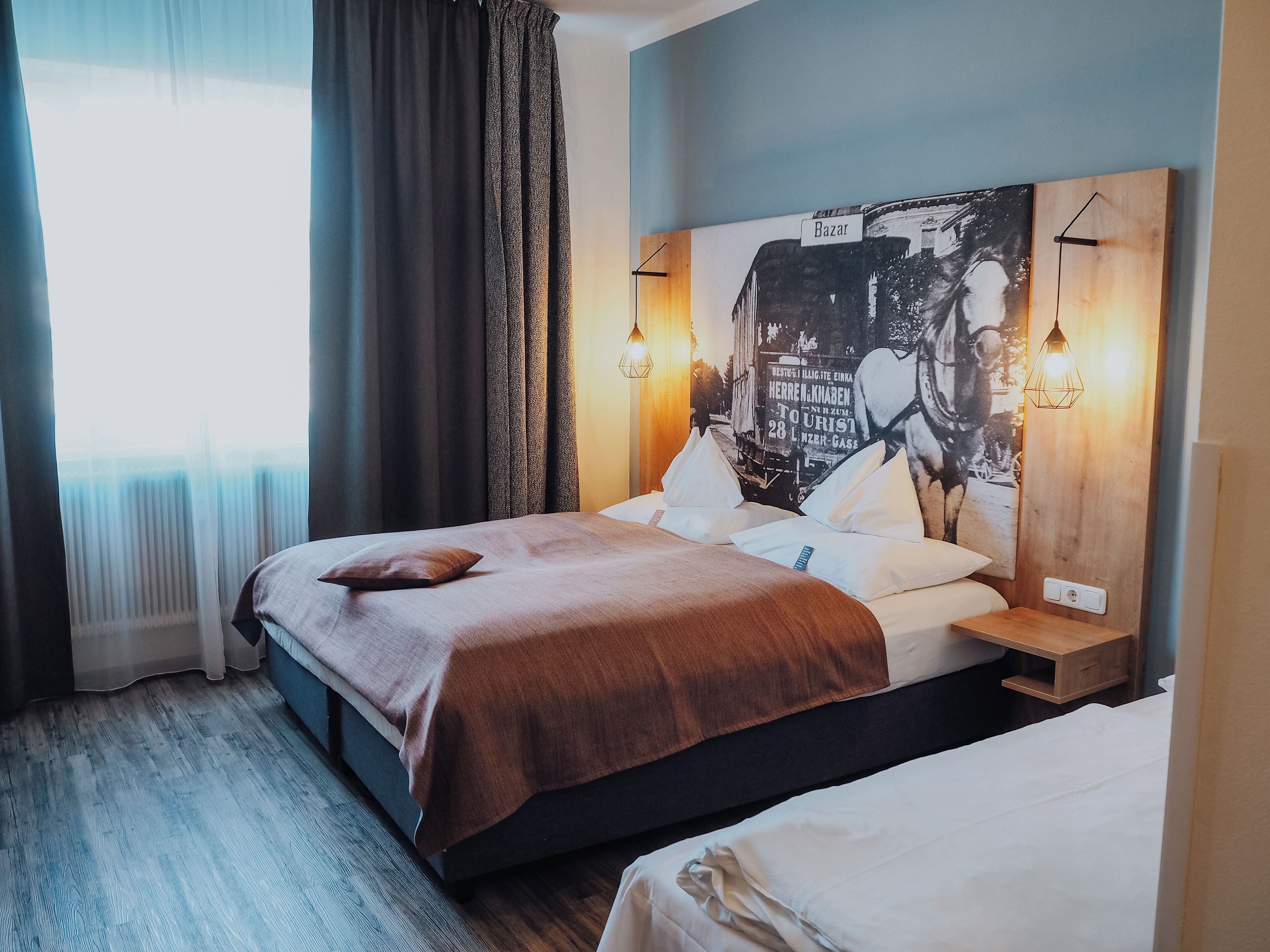 Triple Room | Minibar, in-room safe, desk, laptop workspace