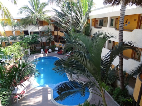 Outdoor pool, open 8:00 AM to 9:00 PM, pool umbrellas, sun loungers