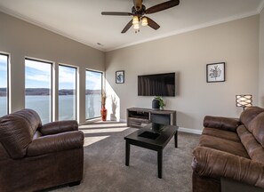 Deluxe Condo, 2 Bedrooms, Lake View | Living room | Flat-screen TV, fireplace - D'Monaco Luxury Resort (Ridgedale)