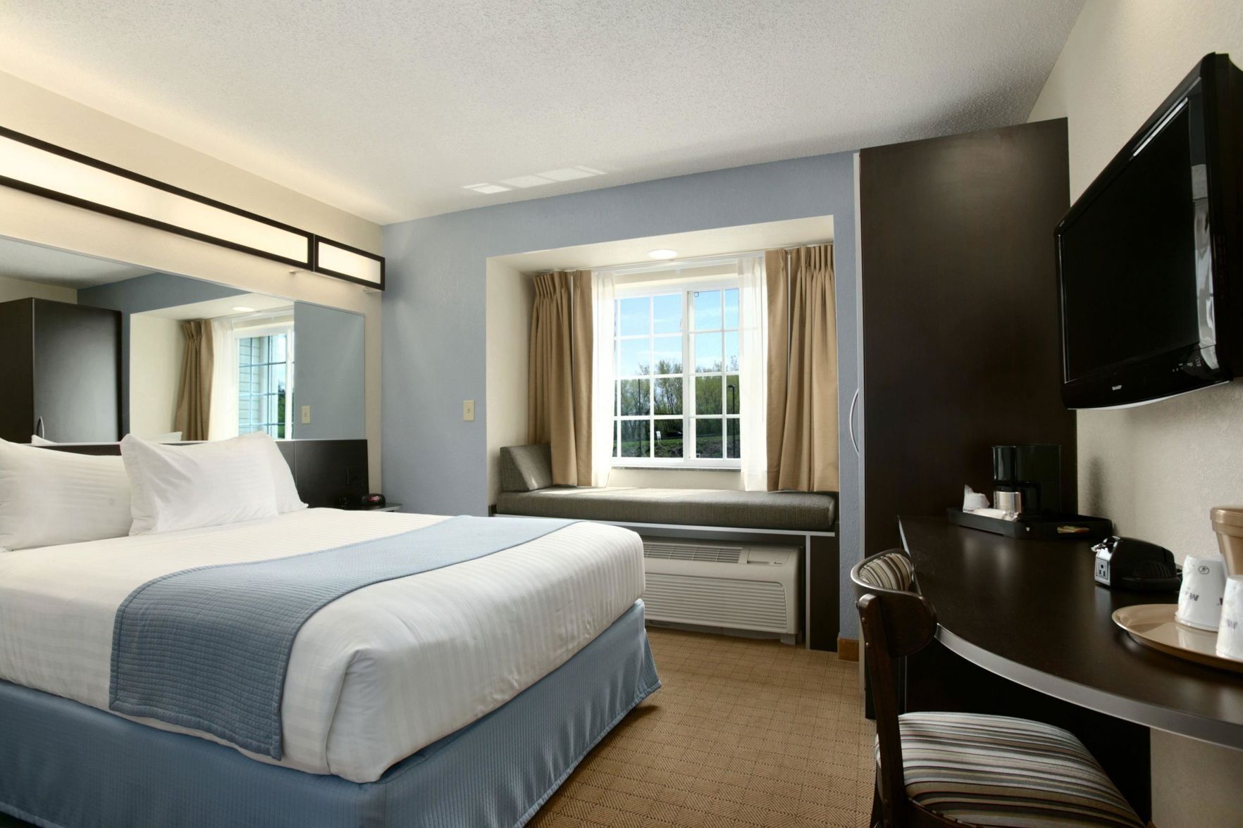 Premium bedding, pillow-top beds, in-room safe, desk