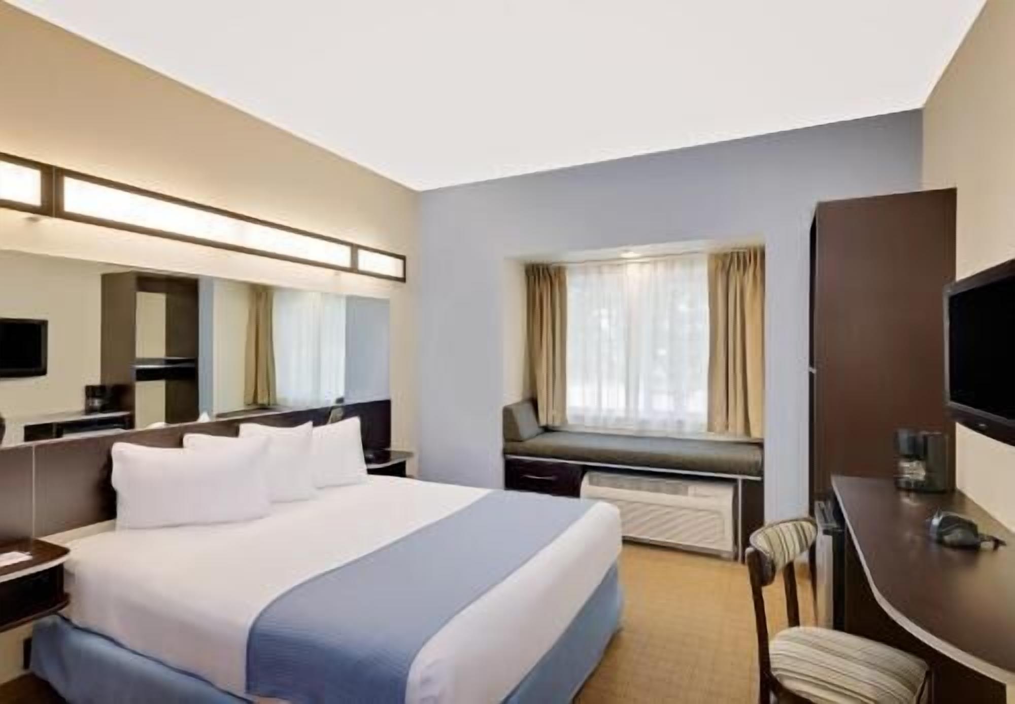 Premium bedding, pillow-top beds, in-room safe, desk