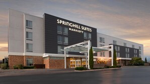 A modern hotel with a large sign reading "Springhill Suites Marriott". - SpringHill Suites by Marriott San Angelo (San Angelo)