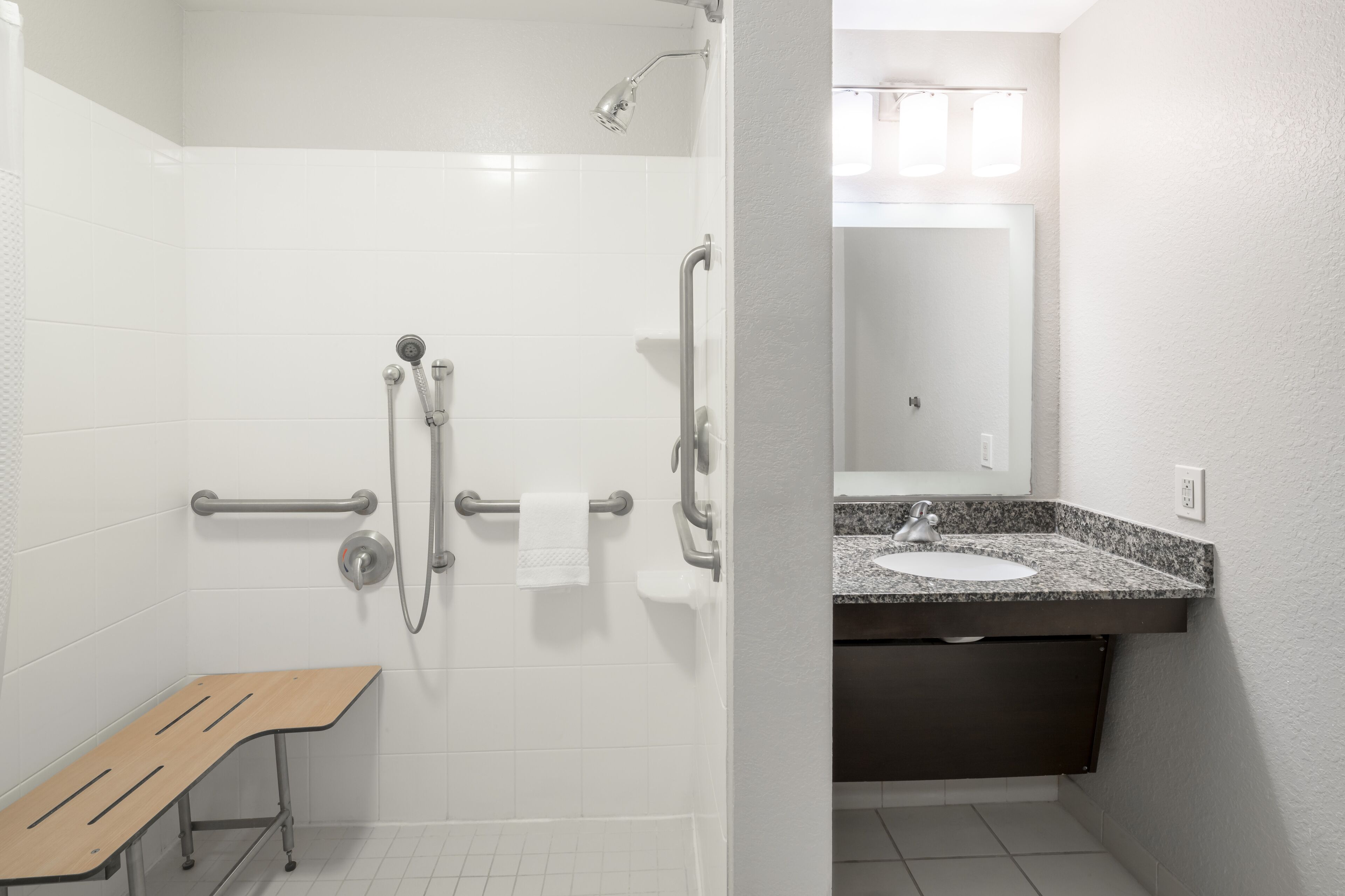 combined shower/bathtub, free toiletries, hair dryer, towels