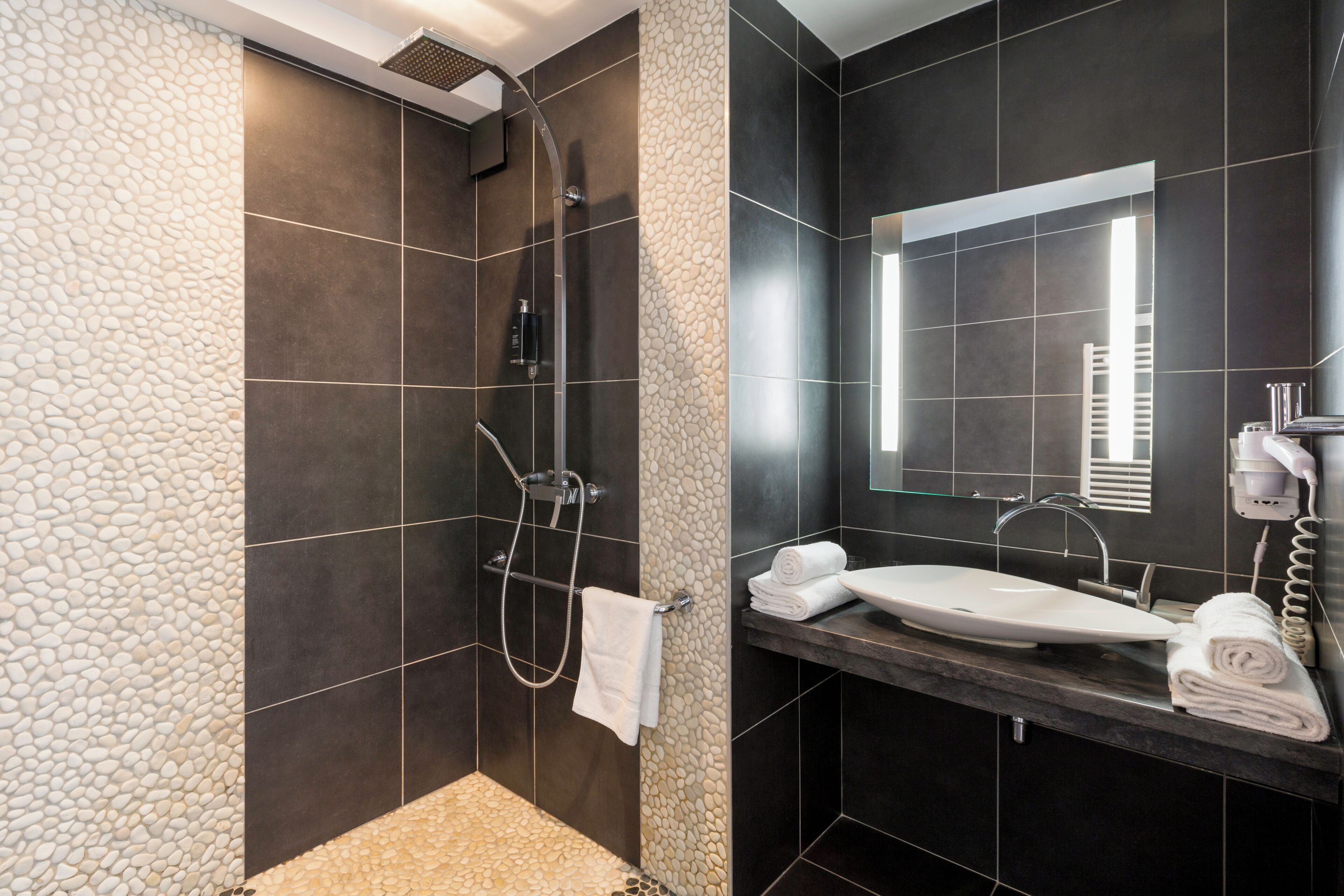 shower, free toiletries, hair dryer, towels