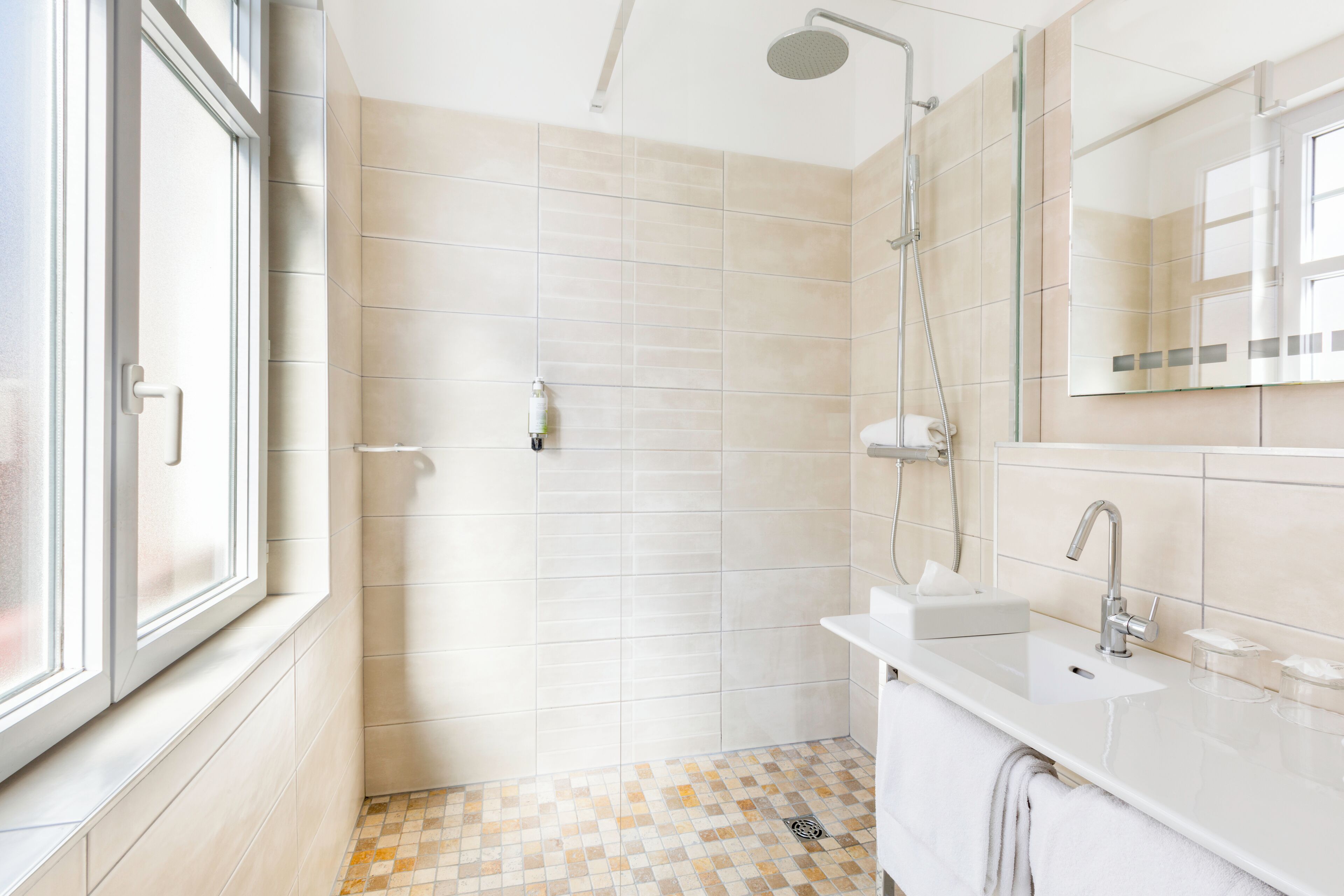 shower, free toiletries, hair dryer, towels