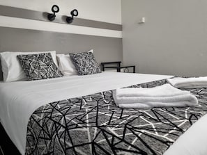 Desk, laptop workspace, free WiFi, bed sheets