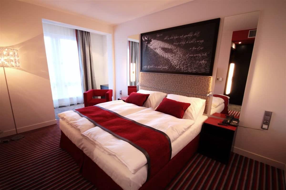 Premium bedding, memory foam beds, in-room safe, desk