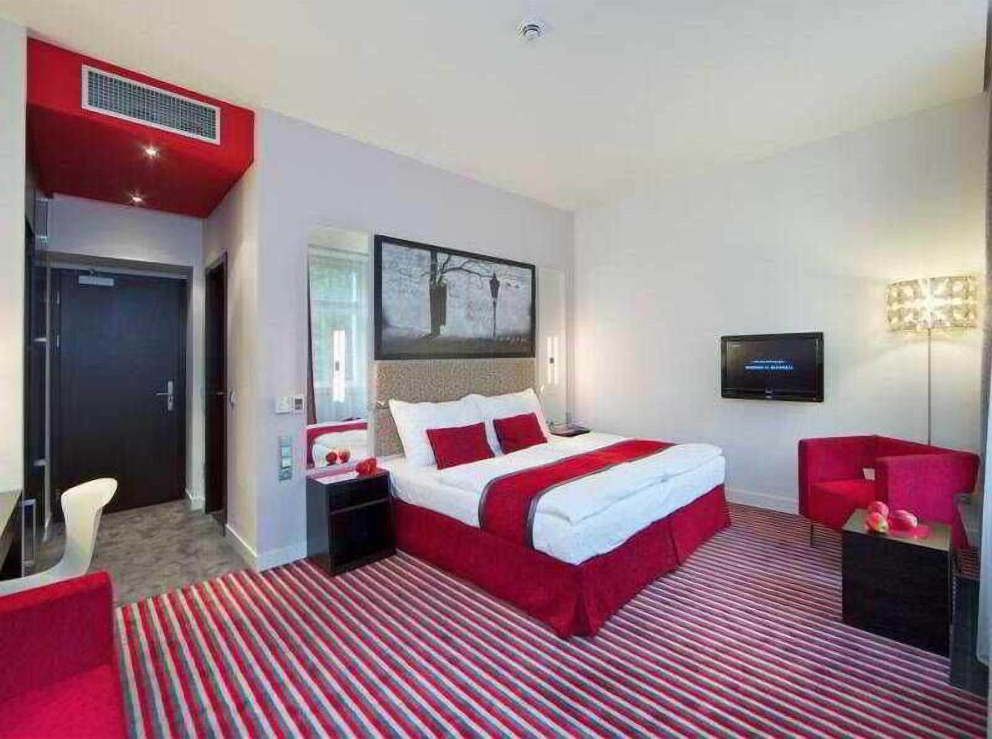 Premium bedding, memory-foam beds, in-room safe, desk