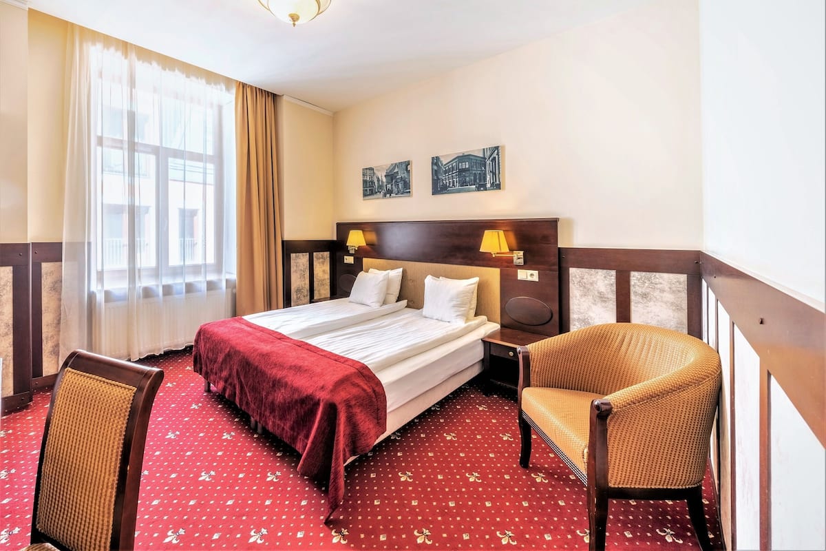 Standard Double or Twin Room | Minibar, in-room safe, desk, laptop workspace