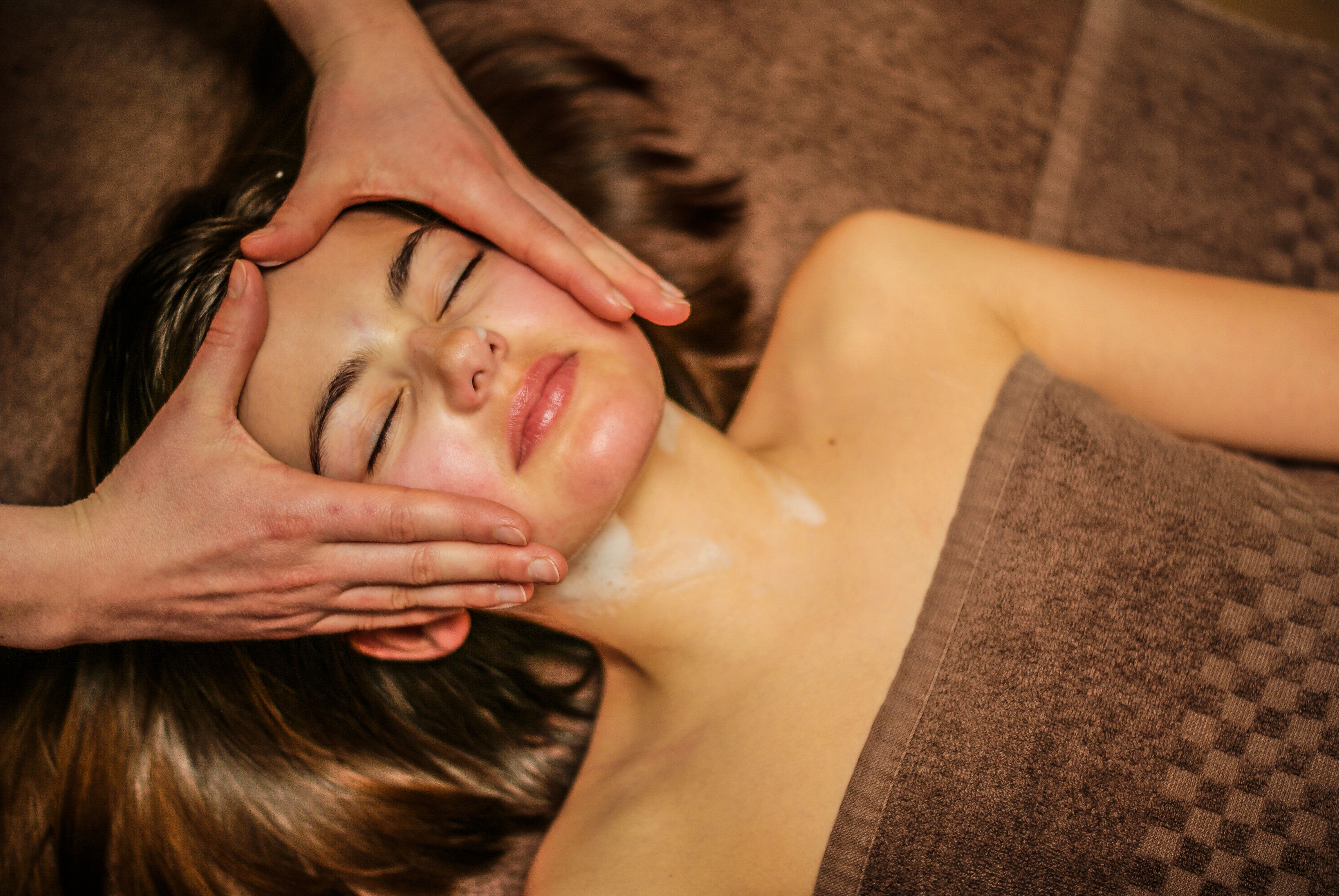 A person receiving a facial treatment.