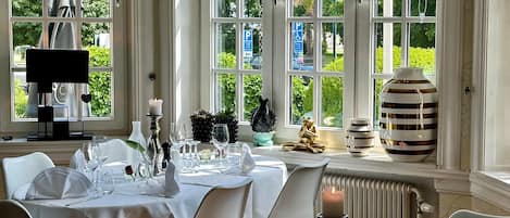 Breakfast, lunch served; local and international cuisine, garden views