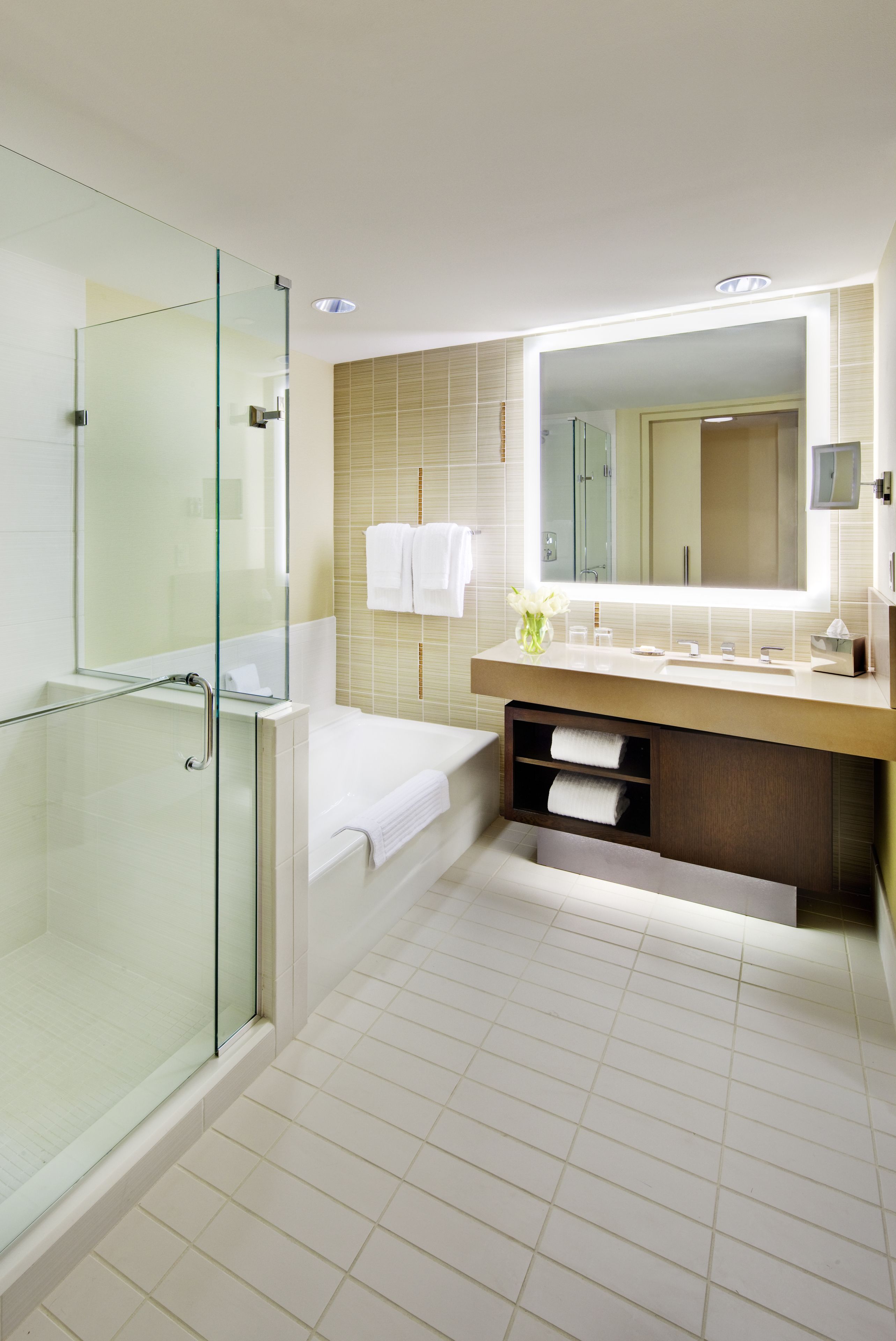 separate bathtub and shower, deep-soaking bathtub, designer toiletries