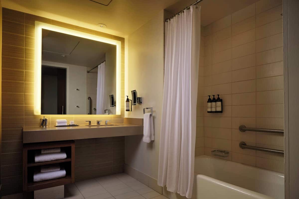 Separate tub and shower, deep soaking tub, designer toiletries