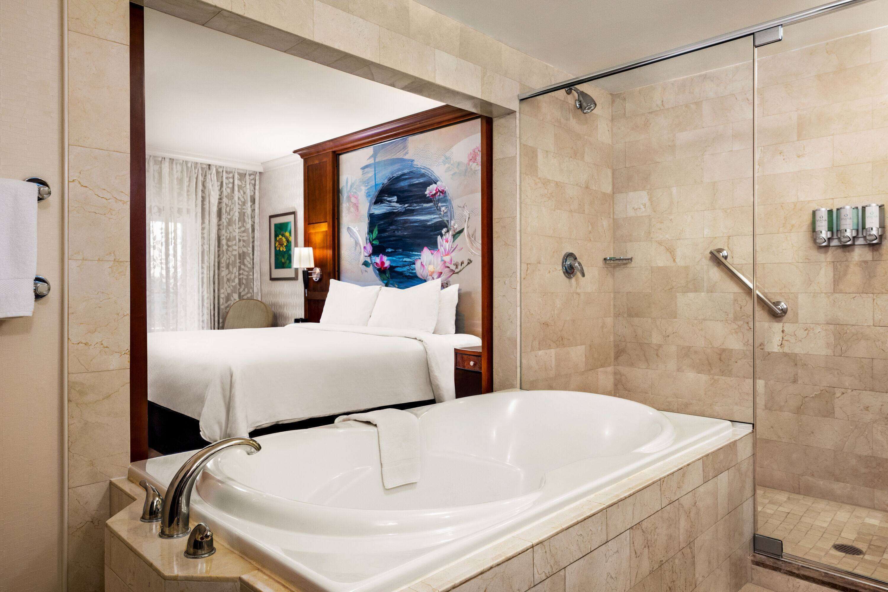 suite, 1 king bed, non smoking (hydrotherapy) | bathroom | shower, designer toiletries, hair dryer, bathrobes