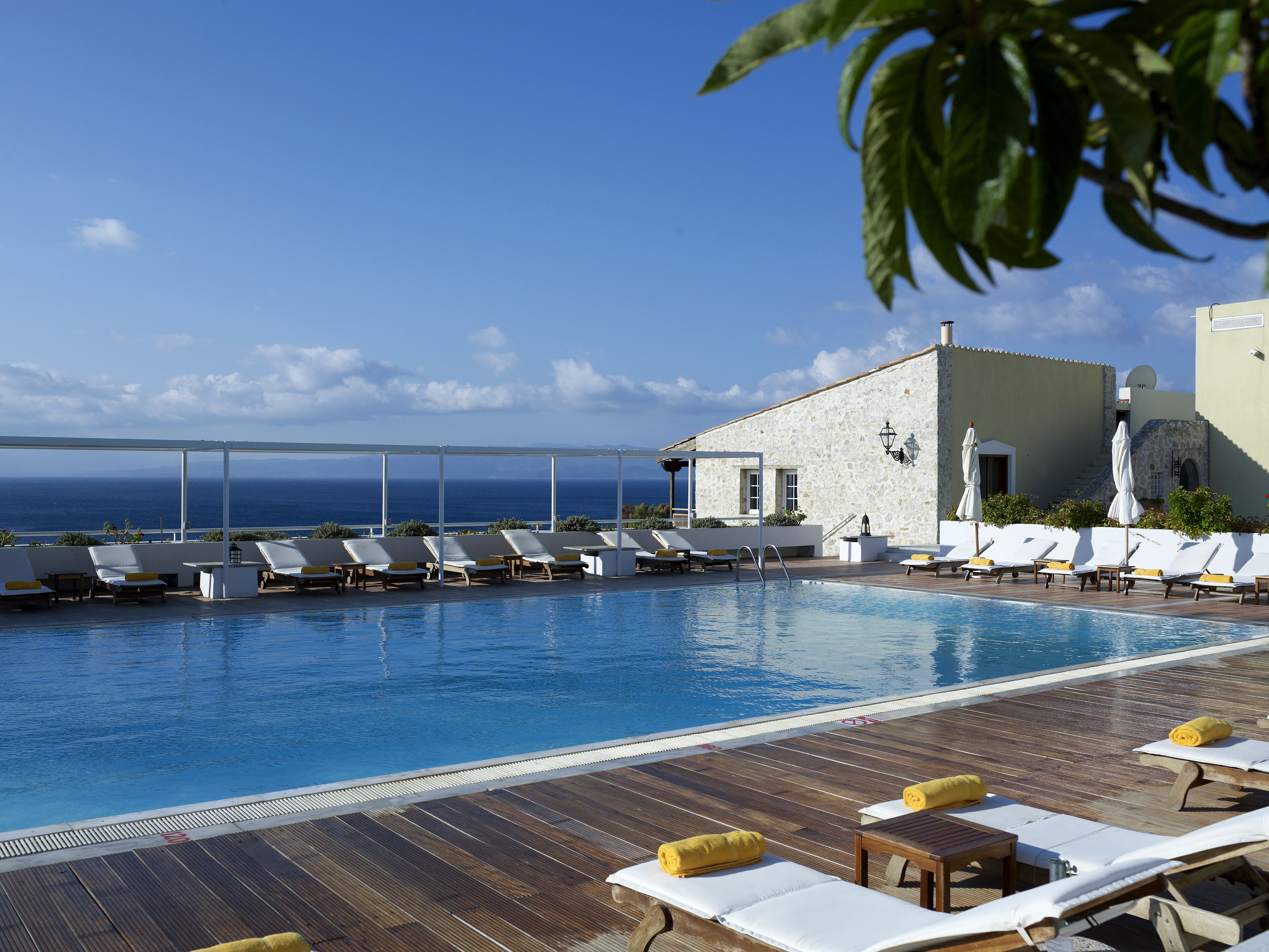 outdoor pool, open 9:30 am to 6:30 pm, pool umbrellas, pool loungers