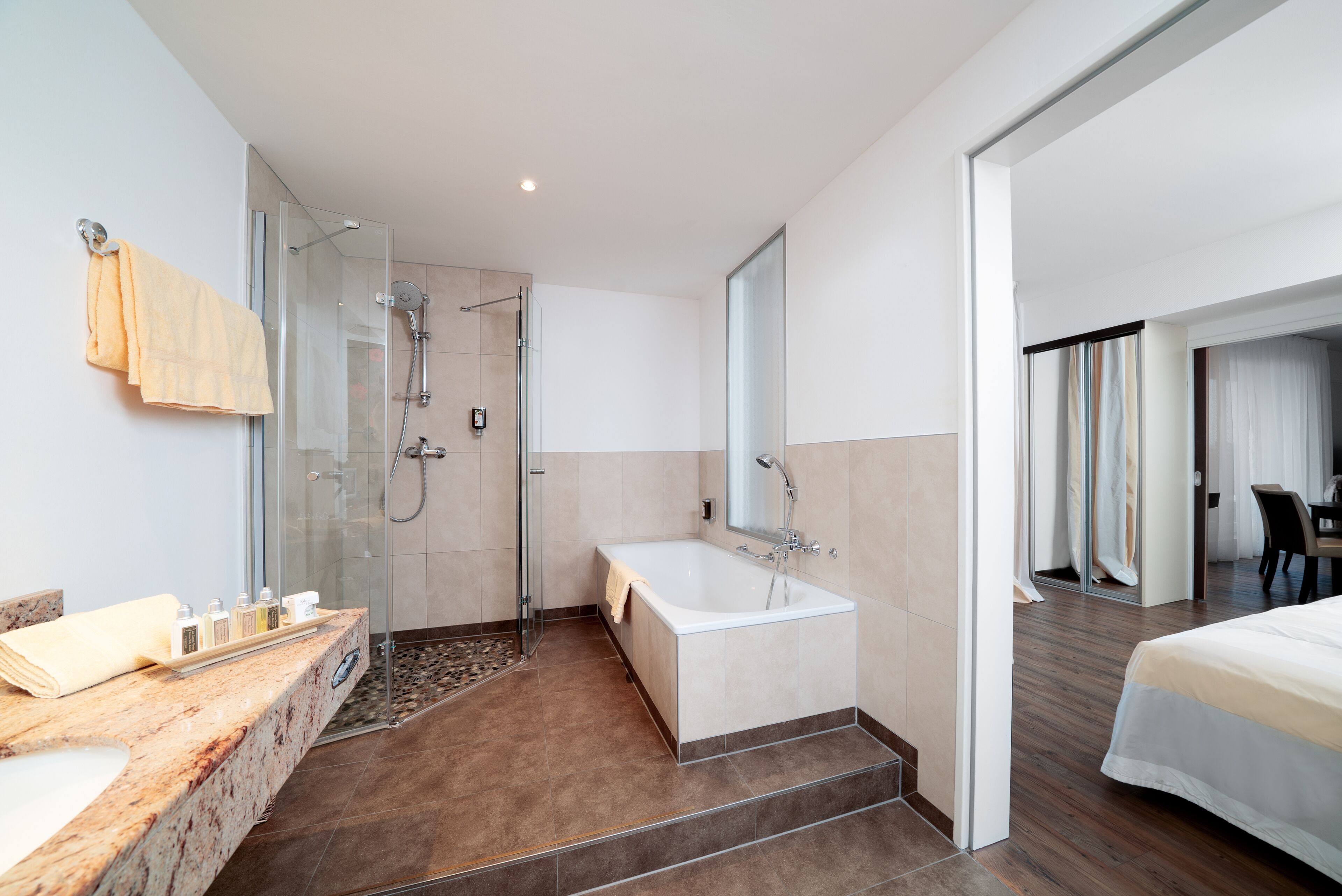 grand suite | bathroom | hair dryer, bathrobes, towels