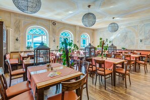 Lunch, dinner served; international cuisine, al fresco dining 