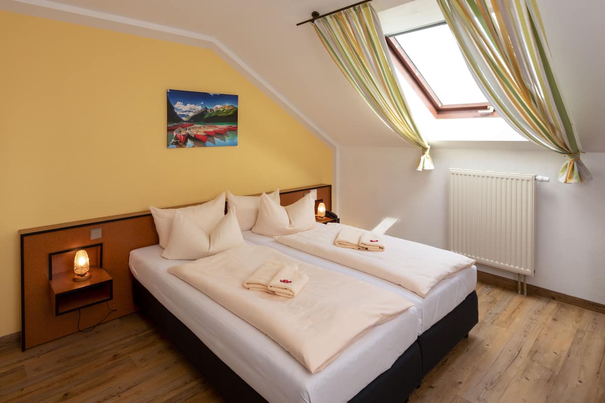 desk, blackout curtains, free wifi, bed sheets