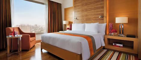 Club suite, 1 slaapkamer | 1 slaapkamer, luxe beddengoed, een minibar, een kluis op de kamer