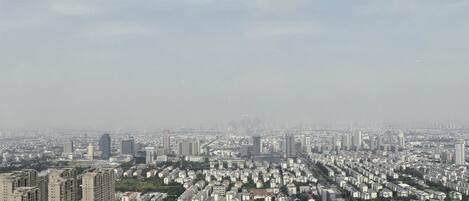 A cityscape with numerous high-rise buildings and a dense urban layout.
