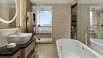 Separate tub and shower, hair dryer, bathrobes, slippers