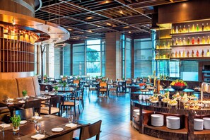 2 restaurants, breakfast, lunch, dinner served; Indian cuisine 