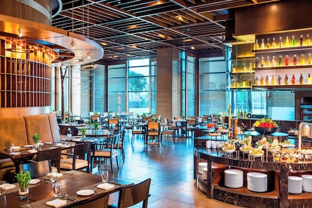 2 restaurants, breakfast, lunch, dinner served; Indian cuisine