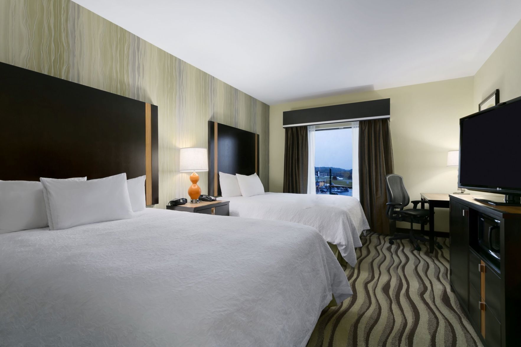 In-room safe, desk, iron/ironing board, free cribs/infant beds