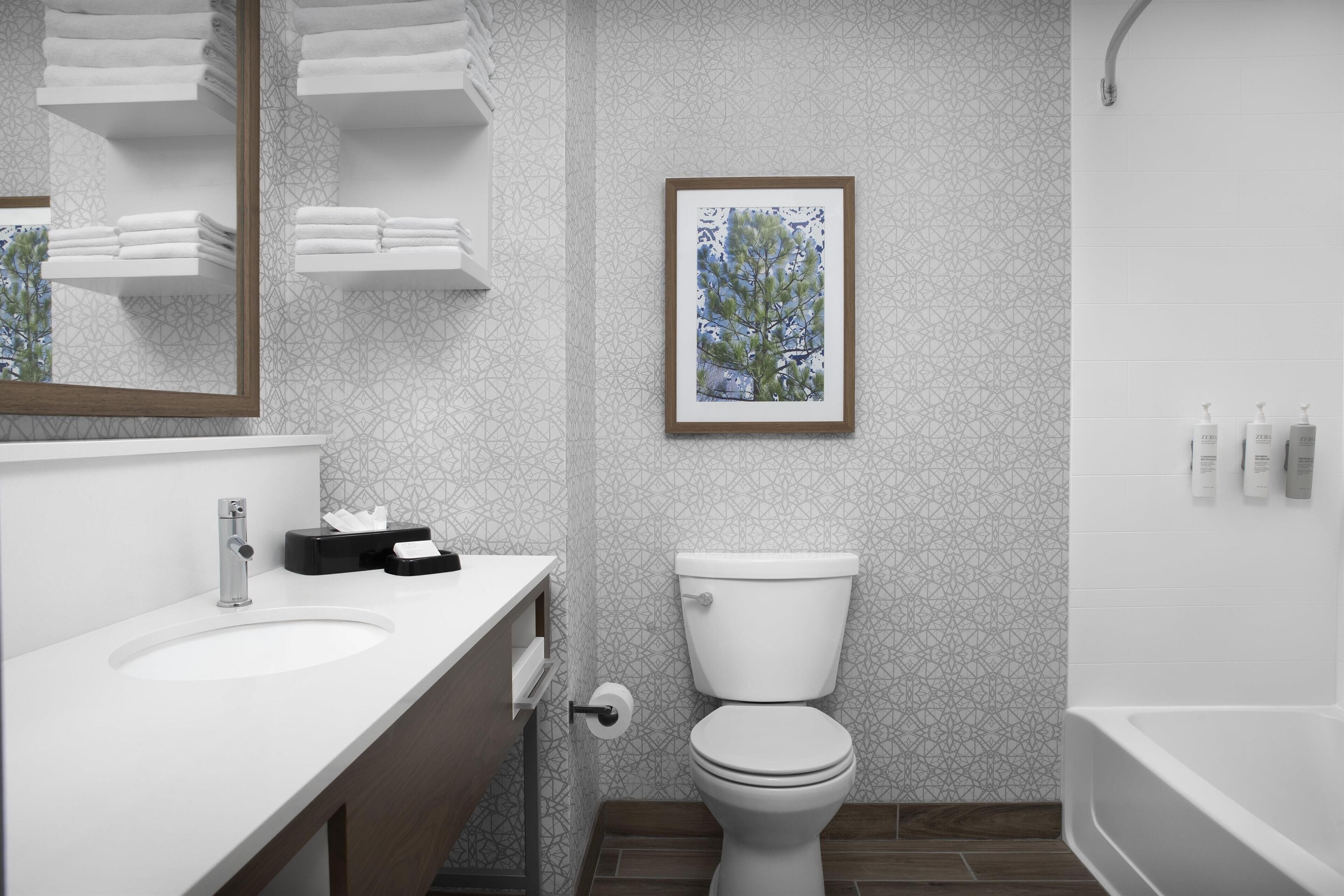 two queen beds non-smoking | bathroom | hair dryer, towels