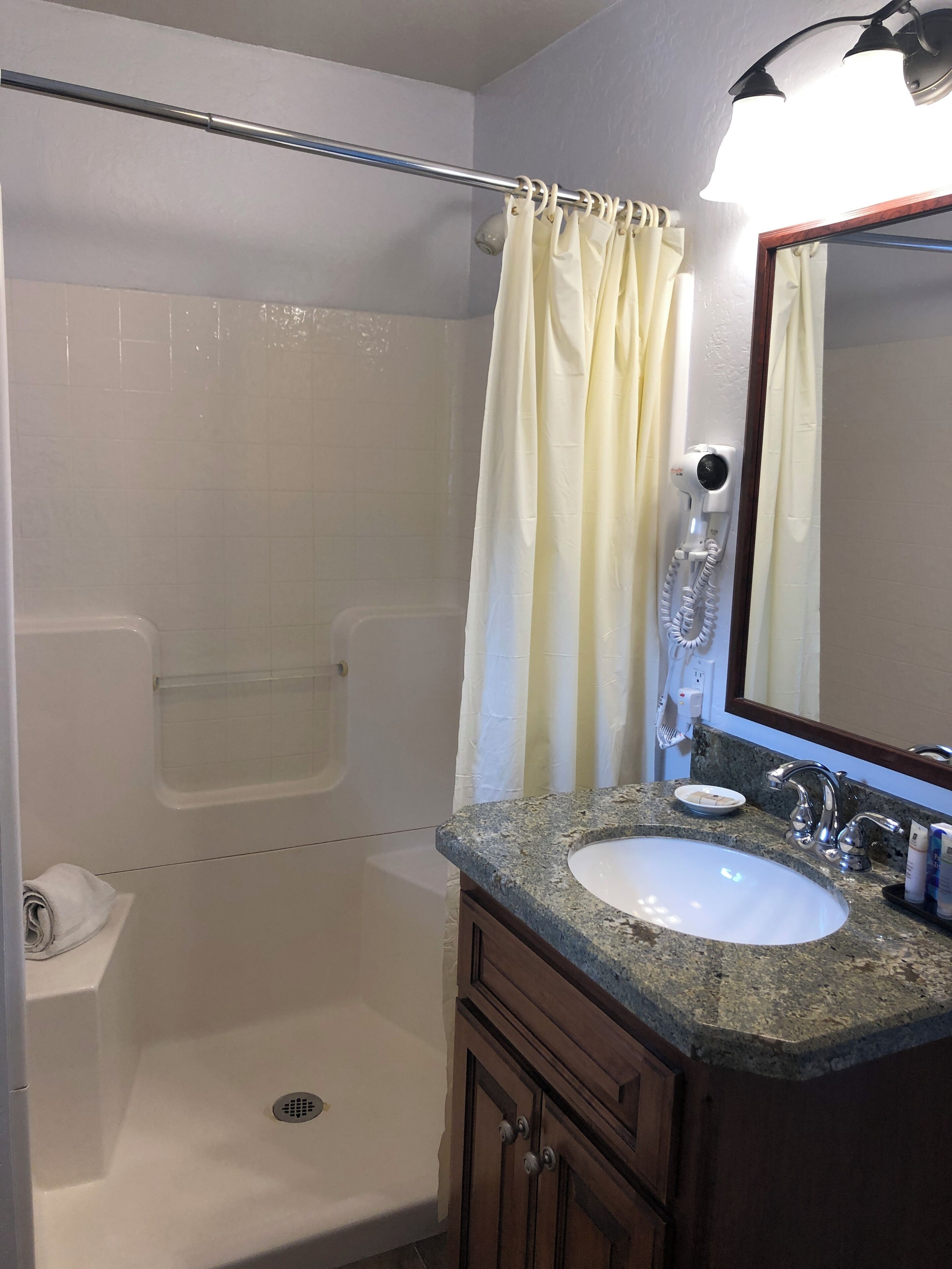 basic room, 1 queen bed | bathroom | shower, free toiletries, hair dryer, towels
