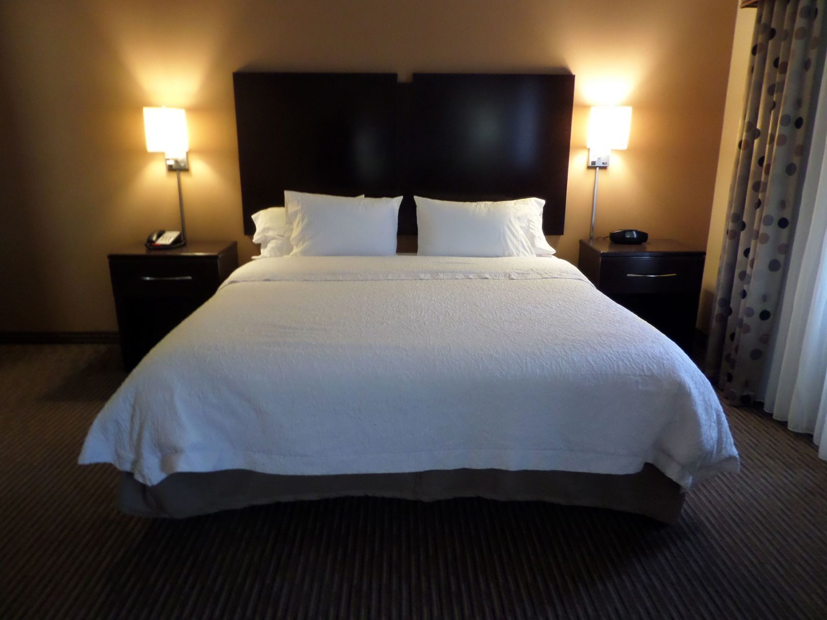 Premium bedding, in-room safe, blackout drapes, soundproofing