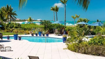 Outdoor pool, pool umbrellas, sun loungers