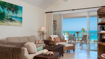 Luxury Condo, 3 Bedrooms, Sea View, Beachfront | Living room | 32-inch flat-screen TV with cable channels, TV, DVD player