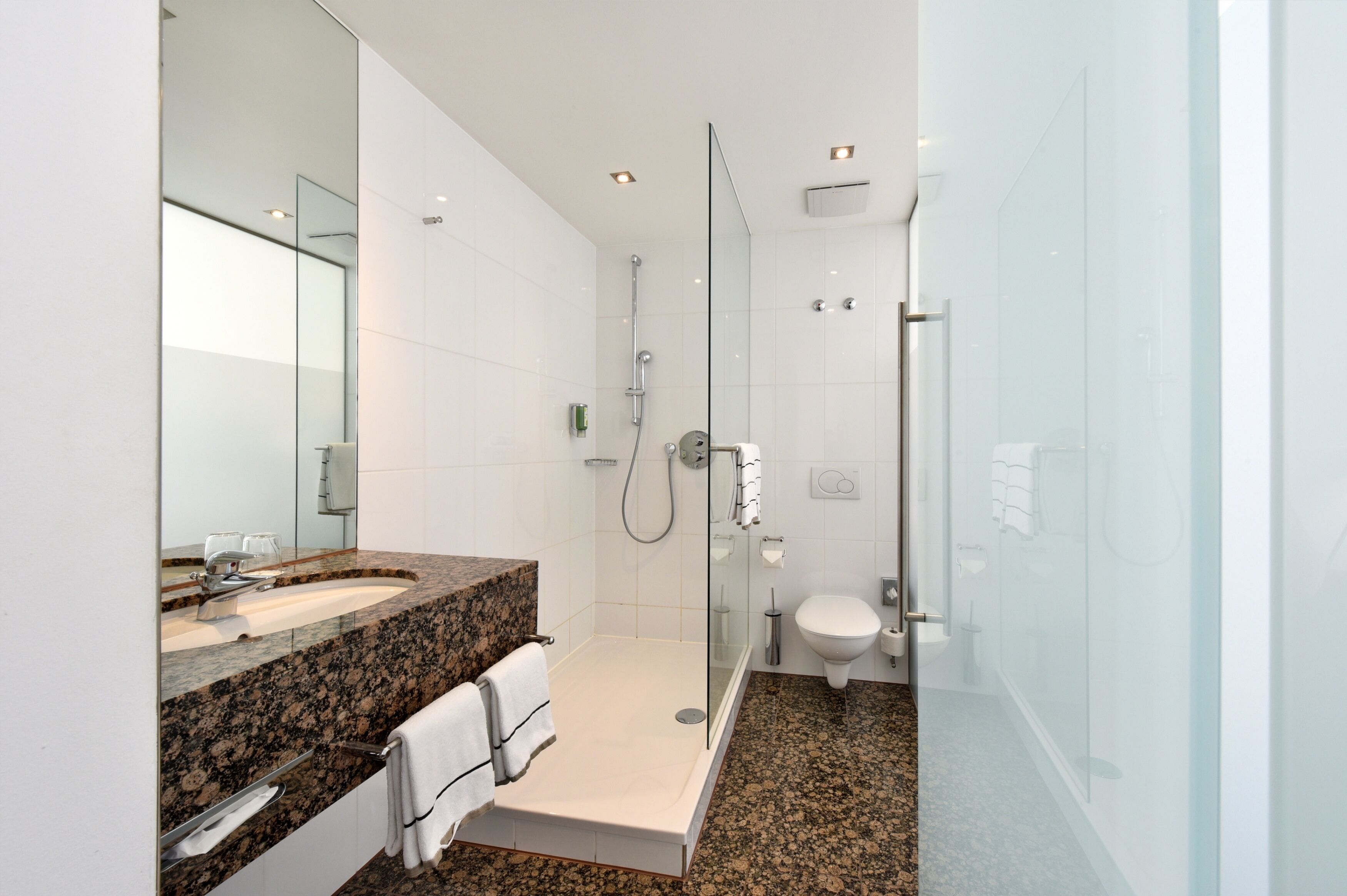 business double room | bathroom | shower, eco-friendly toiletries, hair dryer, bathrobes