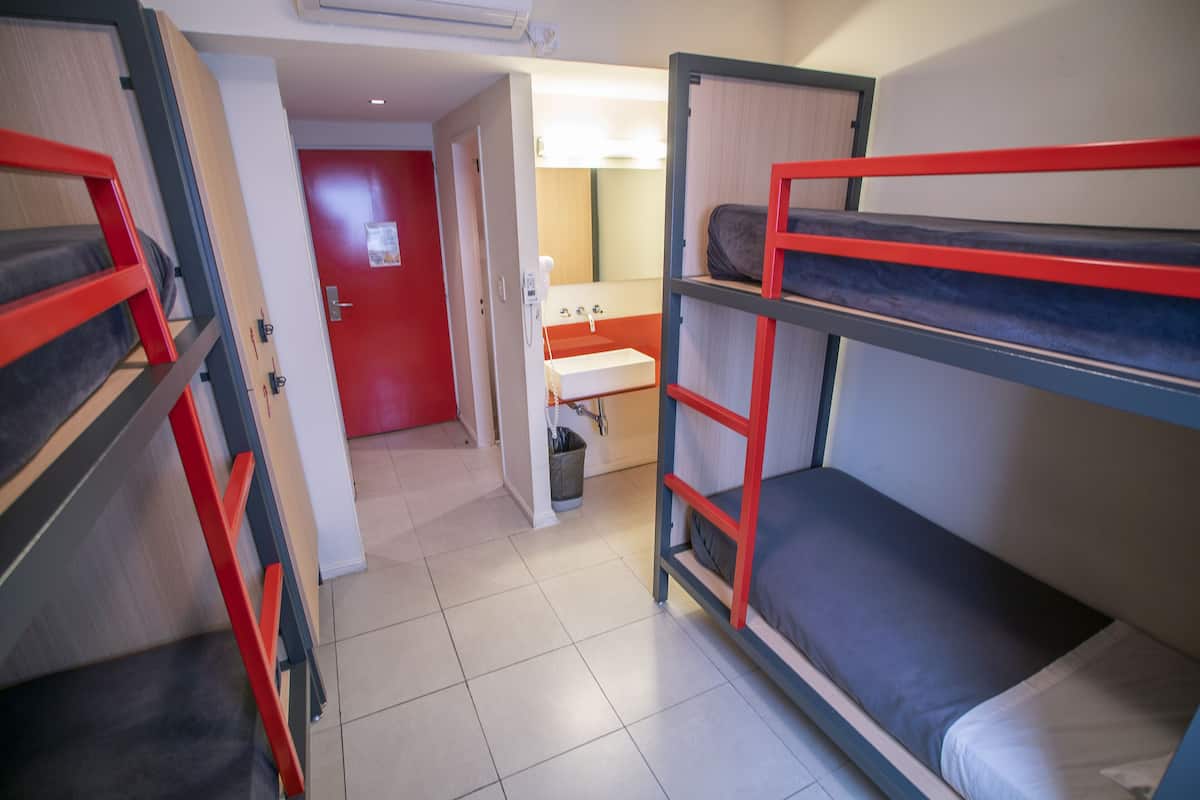 Pillow-top beds, blackout curtains, soundproofing, free WiFi