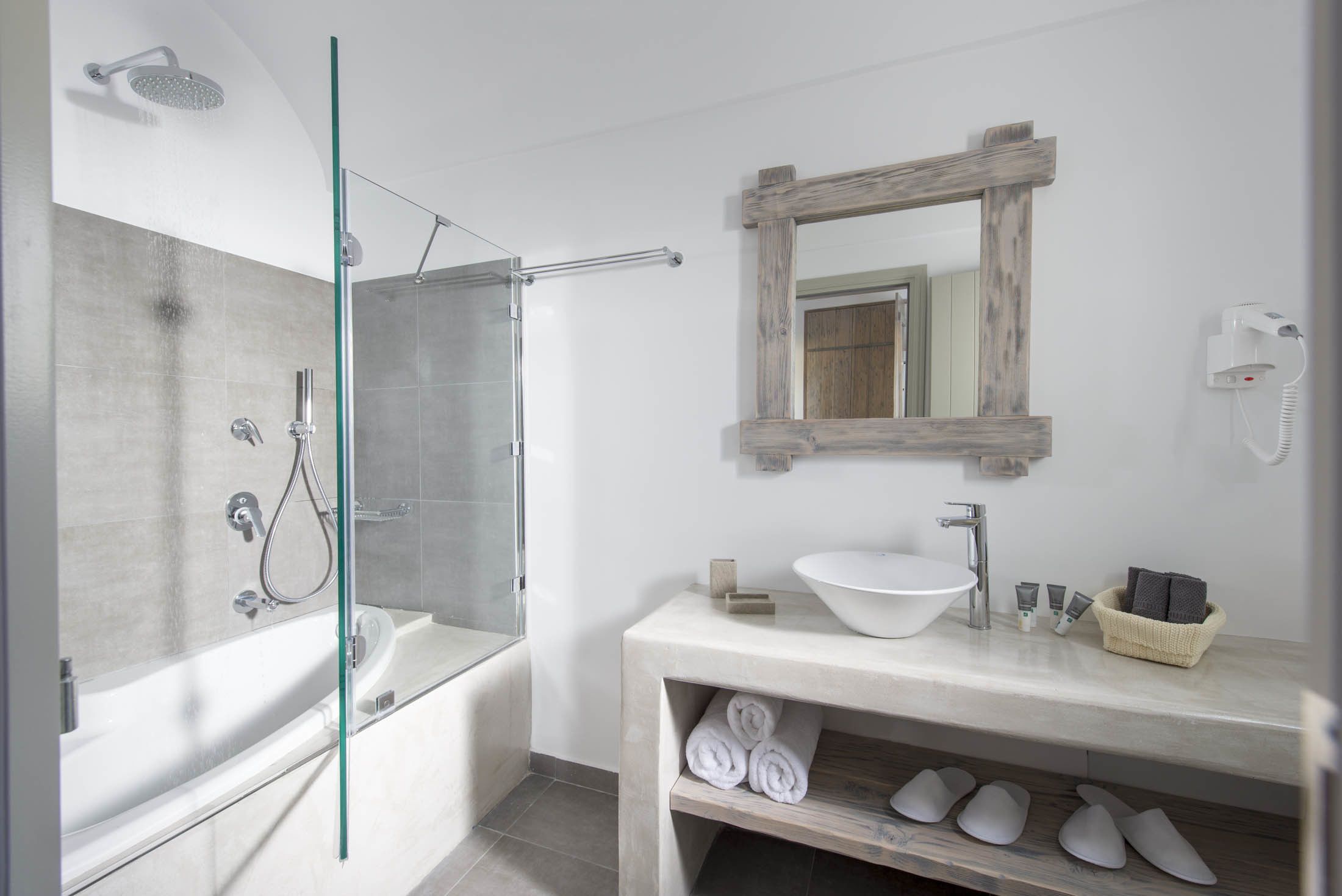 honeymoon suite, jetted tub | bathroom | rainfall showerhead, free toiletries, hair dryer, bathrobes
