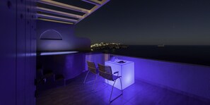 In-room safe, soundproofing, free WiFi, bed sheets - Caldera's Dolphin Suites (Santorini)