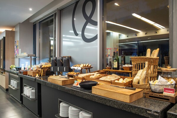 Enjoy a self-service breakfast with a variety of bread, pastries, and beverages.